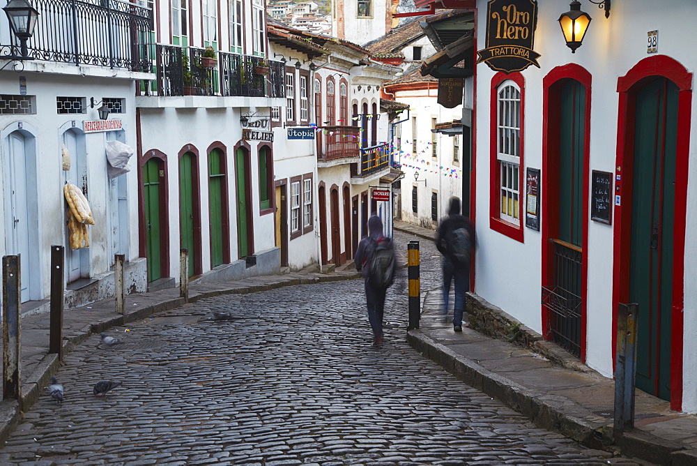 People walking along street, Ouro Preto, UNESCO World Heritage Site, Minas Gerais, Brazil, South America 