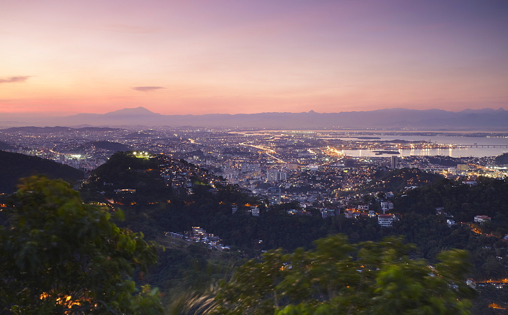 View over city centre at dusk, Rio de Janeiro, Brazil, South America 