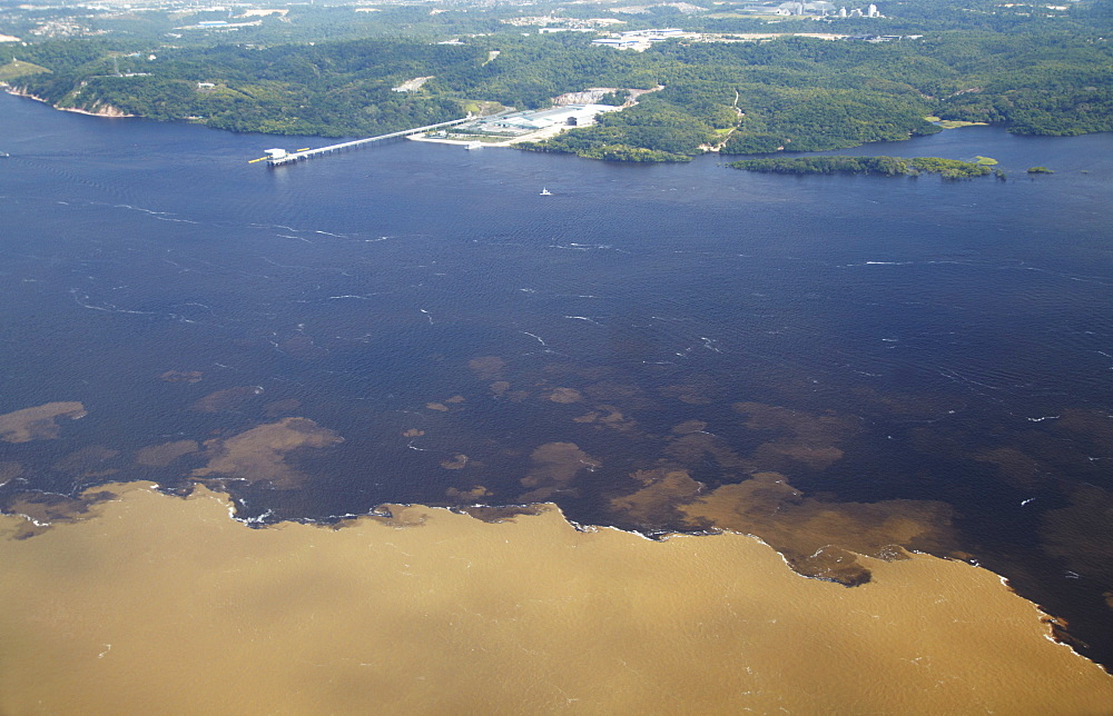 Aerial view of Encontro das Aguas, meeting of the Rio Negro and Rio Solimoes, Manaus, Amazonas, Brazil, South America 