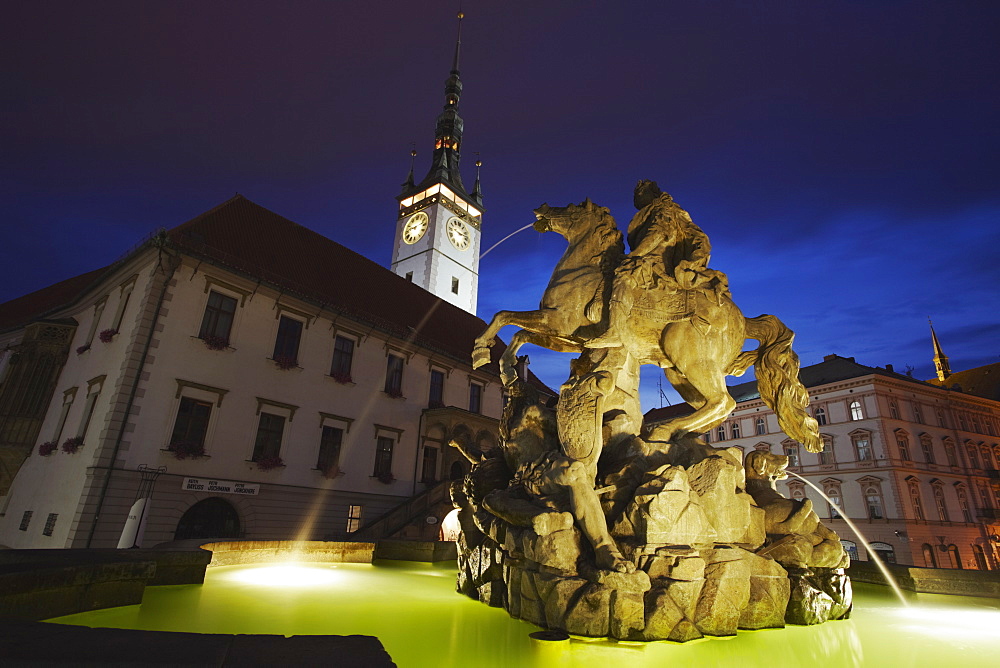 Caesar's Fountain and Town Hall in Upper Square (Horni Namesti) at dusk, Olomouc, Moravia, Czech Republic, Europe