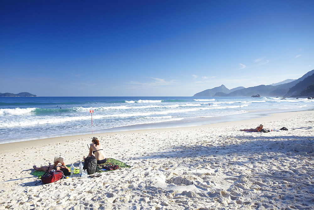 People sunbathing on Lopes Mendes beach, Ilha Grande, Rio de Janeiro State, Brazil, South America