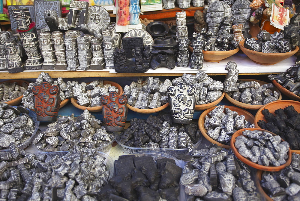 Carved stone souvenirs in Witches' Market, La Paz, Bolivia, South America