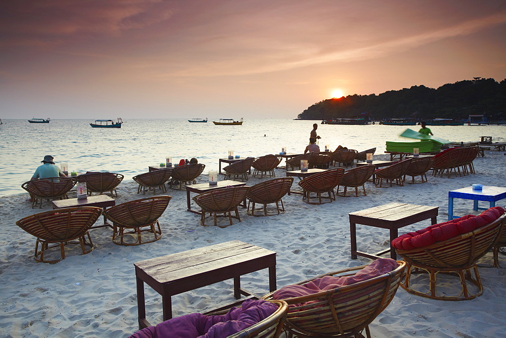 Beach restaurants at dusk on Ochheuteal Beach, Sihanoukville, Cambodia, Indochina, Southeast Asia, Asia 