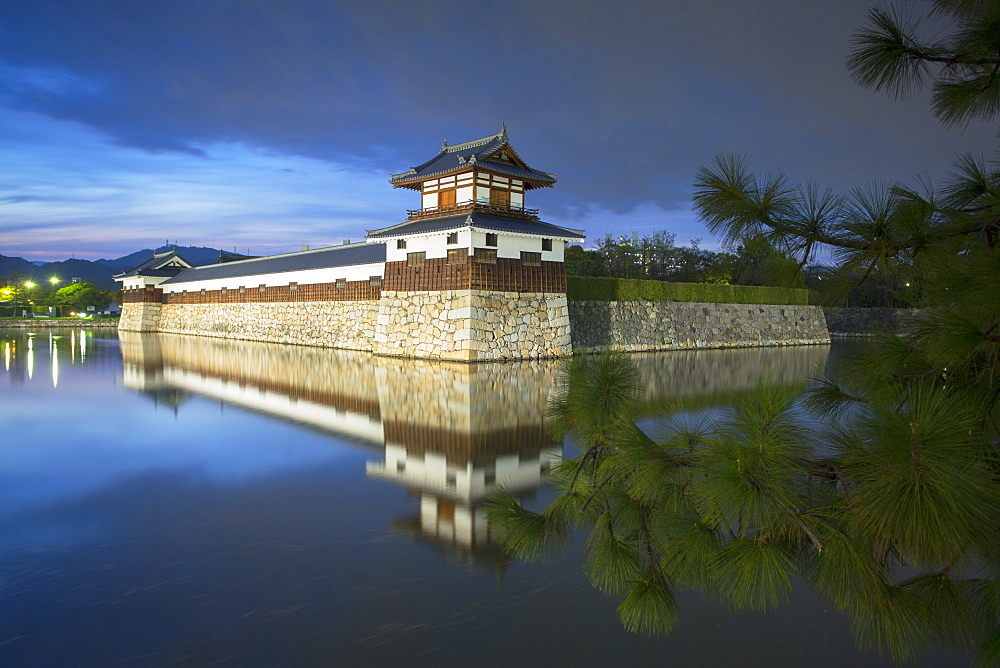 Tower and moat of Hiroshima castle at dusk, Hiroshima, Hiroshima Prefecture, Japan, Asia