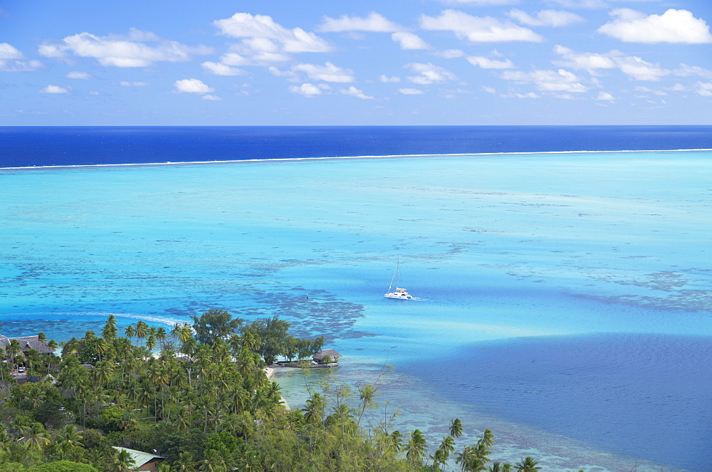 View of yacht in lagoon, Bora Bora, Society Islands, French Polynesia, South Pacific, Pacific