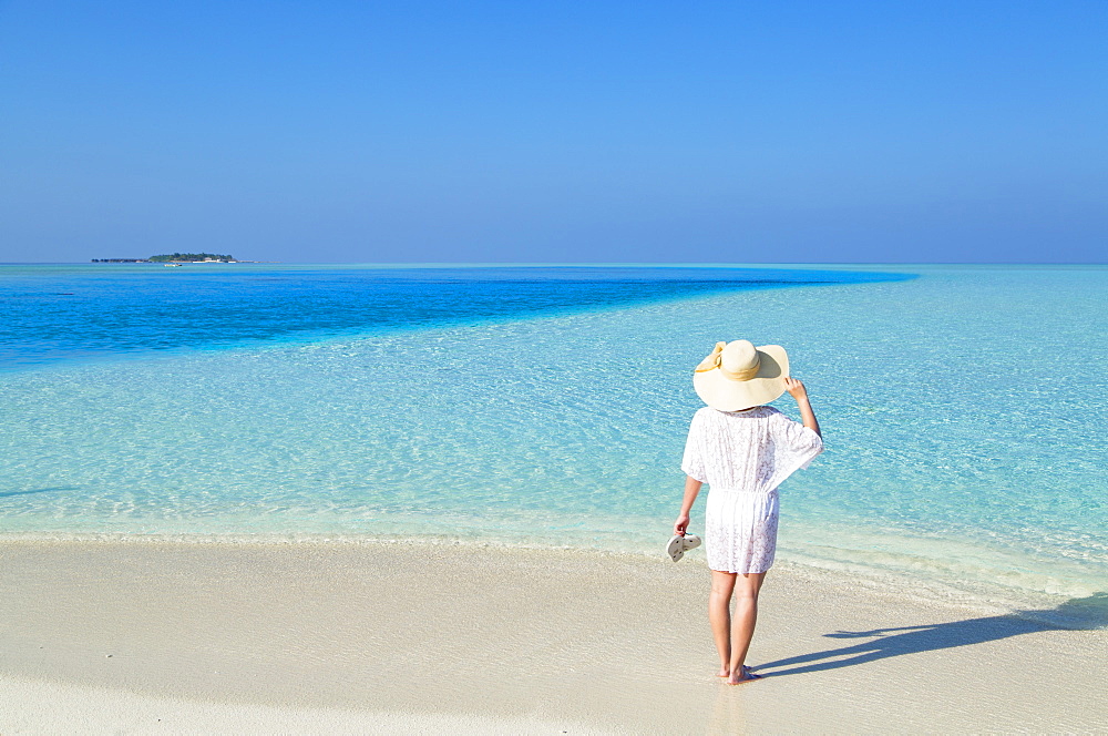 Woman on sandbank, Rasdhoo Island, Northern Ari Atoll, Maldives, Indian Ocean, Asia