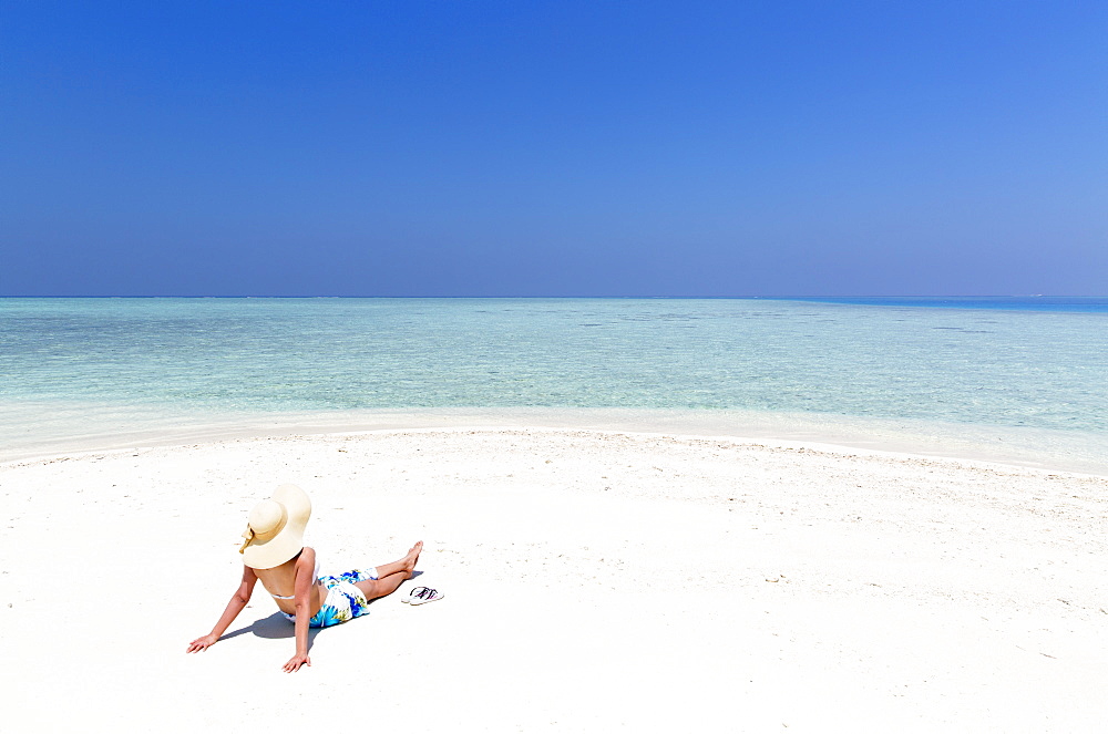 Woman on sandbank, Kaafu Atoll, Maldives, Indian Ocean, Asia