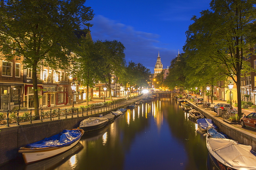 Spiegelgracht canal and Rijksmuseum at dusk, Amsterdam, Netherlands, Europe