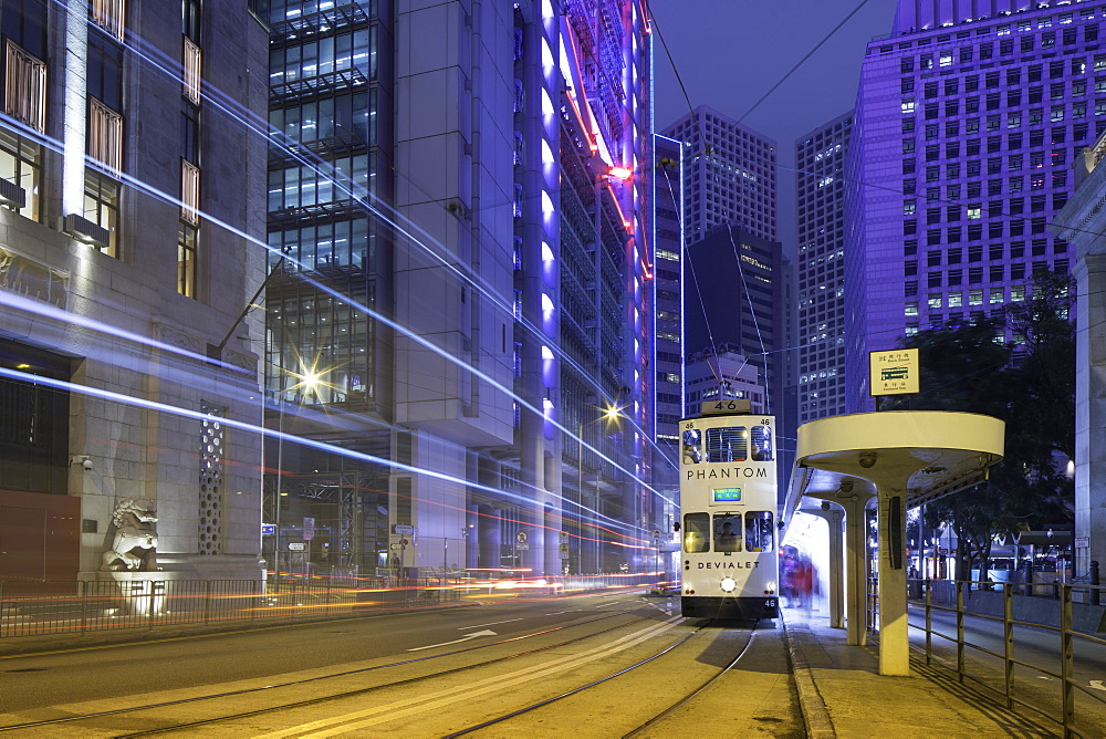 Trams passing Bank of China Building and HSBC Building, Central, Hong Kong, China, Asia