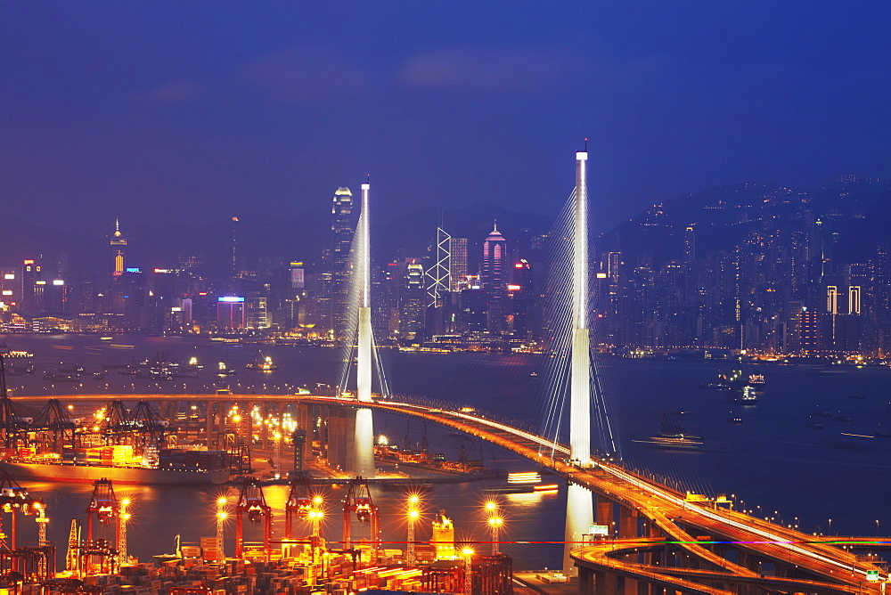 View of Stonecutters Bridge with Hong Kong Island skyline in background, Hong Kong, China, Asia