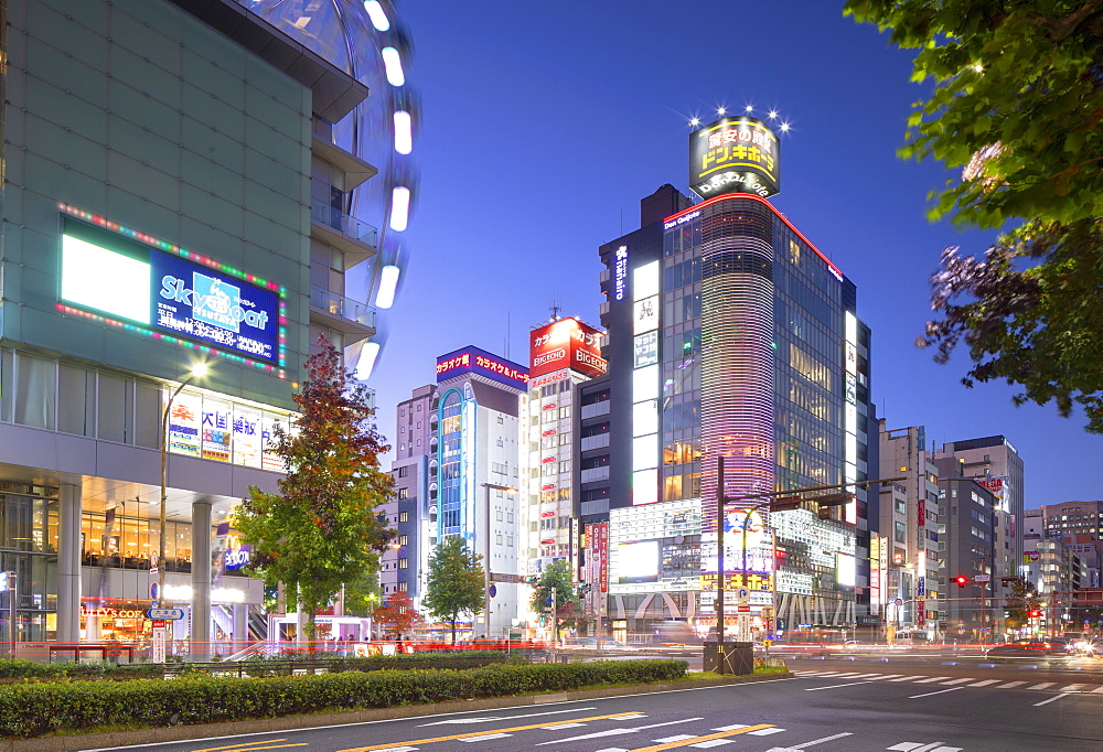 Ferris wheel and shopping street at dusk, Nagoya, Honshu, Japan, Asia