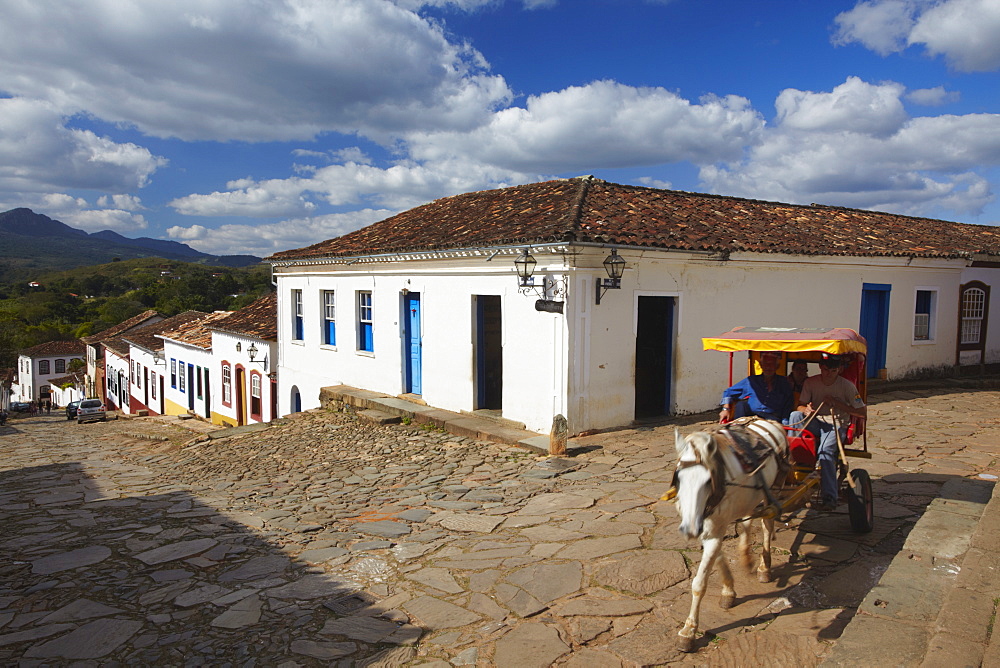 Horse-drawn carriage on cobblestone street, Tiradentes, Minas Gerais, Brazil, South America 