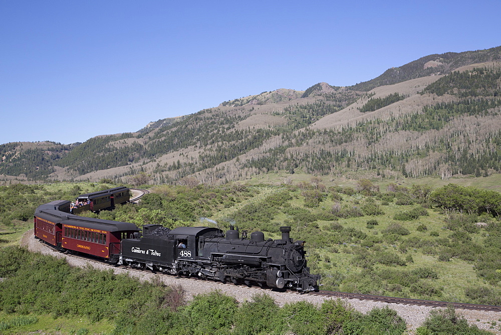 New Mexico and Colorado, Cumbres and Toltec Scenic Railroad, National Historic Landmark, narrow guage, steam powered locomotives, with tourist cars, United States of America, North America