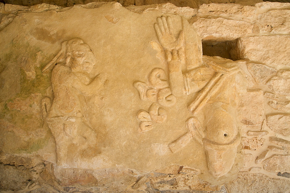 Figures of stucco relief, skeletal heads found in the niches, Castillo de Kukulcan, Mayapan, Mayan archaeological site, Yucatan, Mexico,. North America