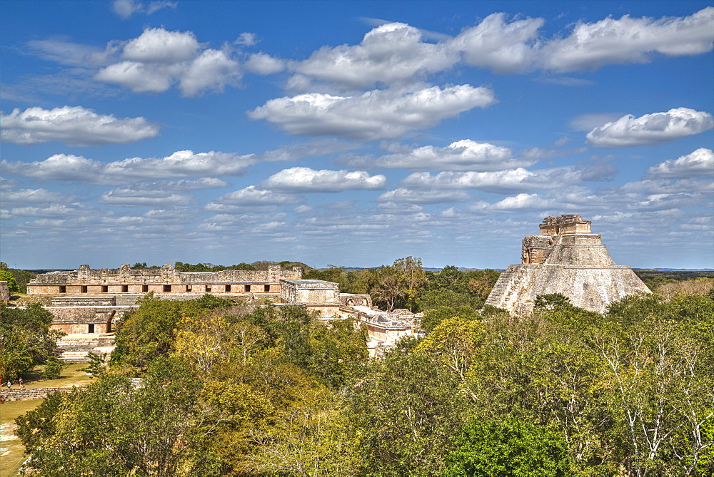 Pyramid of the Magician on right, and Nun's Quadrangle to the left, Uxmal, Mayan archaeological site, UNESCO World Heritage Site, Yucatan, Mexico, North America