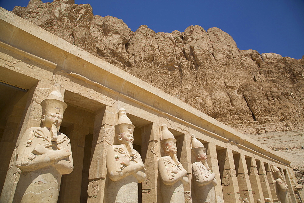 Statues of Osiris, Deir-el-Bahri (Hatshepsut's Temple), West Bank, Thebes, UNESCO World Heritage Site, Egypt, North Africa, Africa