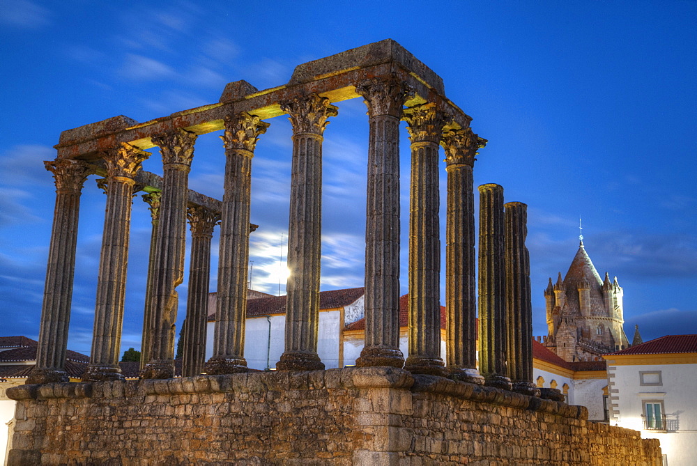 Roman Temple in foreground, Evora Cathdral in the background, Evora, UNESCO World Heritage Site, Portugal, Europe