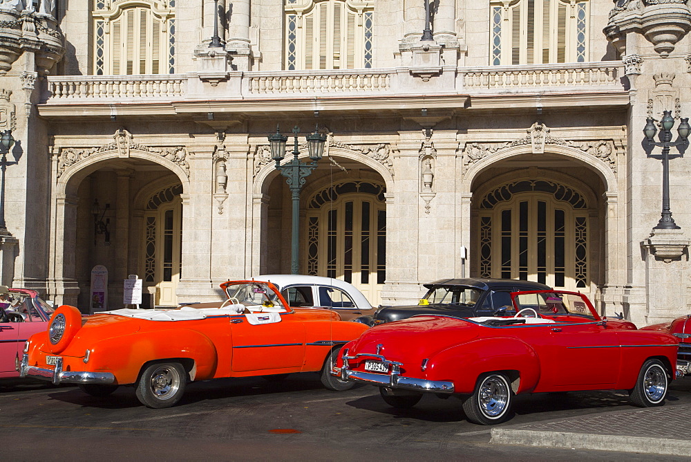 Vintage cars in front of Grand Theater, Centro Habana, Havana, Cuba, West Indies, Central America