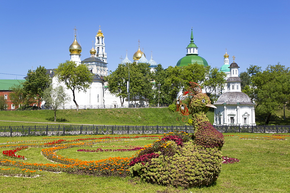 Bird made of flowers in foreground, The Holy Trinity Saint Sergius Lavra, UNESCO World Heritage Site, Sergiev Posad, Russia, Europe