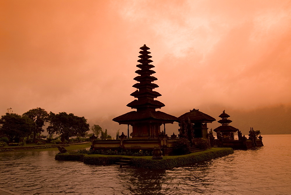 Misty sunrise at Pura Ulun Danu Bratan (Buddhist Temple), Danau Bratan, Bali, Indonesia, Southeast Asia, Asia