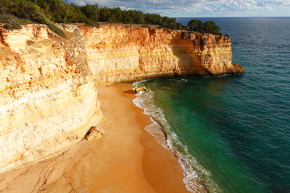 The dramatic cliffs and coastline near Algar de Benagil, Algarve, Portugal