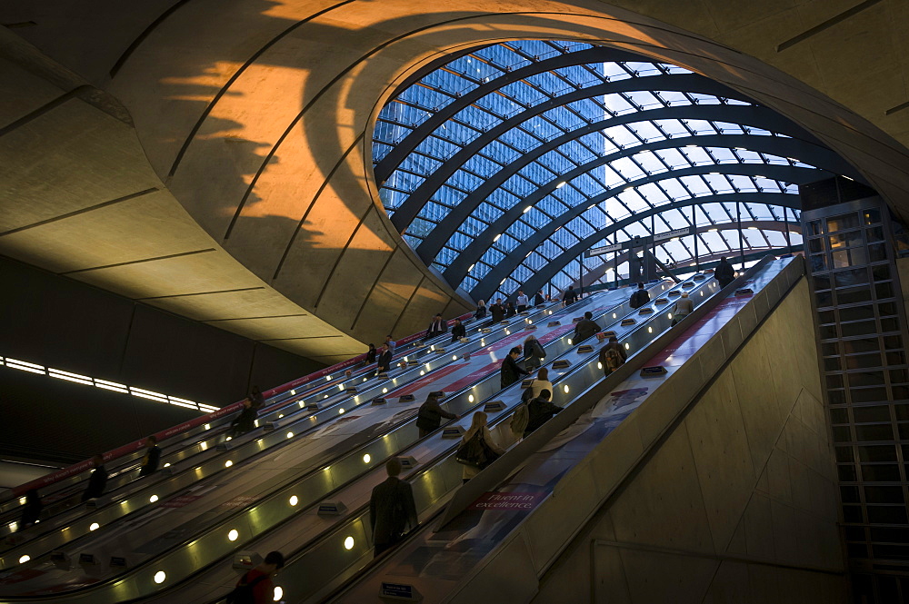 Commuters at Canary Wharf underground station taken as the sun was setting, Docklands, London, England, United Kingdom, Europe