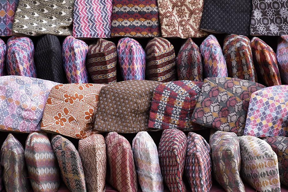 Traditional Nepalese hats on sale on a market stall in Kathmandu, Nepal, Asia