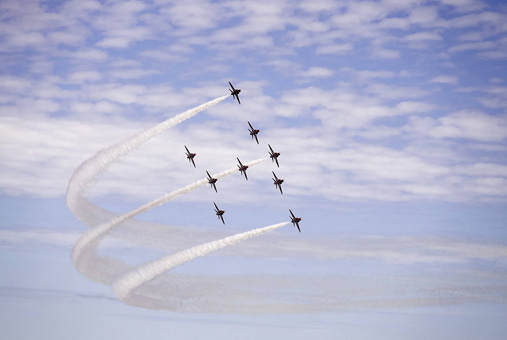 Red Arrows display team at Bournemouth Air Festival in the shape of a Spitfire commemorating the Battle of Britain, Bournemouth, Dorset, England, United Kingdom, Europe