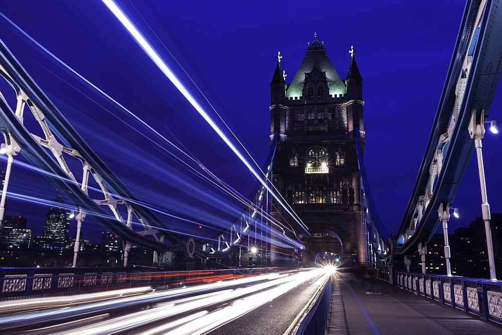 Light trails on London bridge in the evening, London, United Kingdom, Europe