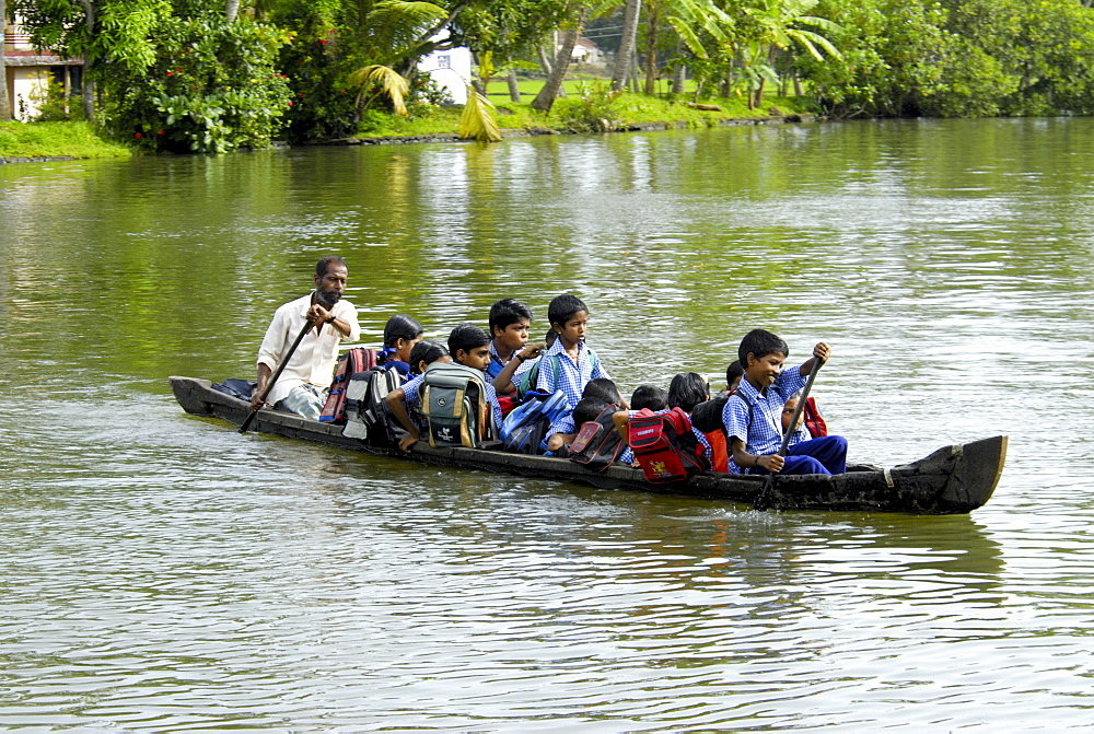 School children in a local boat, Alleppey, Kerala, India, Asia