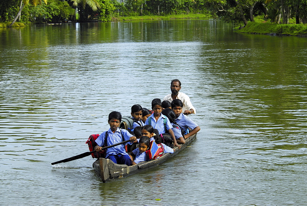 School children in a country boat, Alleppey, Kerala, India, Asia