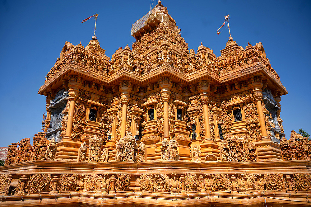 Well maintained golden Taranga Vihar Dham Tirth, a sacred Hindu pilgrimage site, alongside the road between Dhrangadhra and Halyad