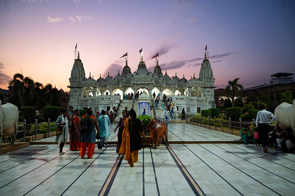 Hindu devotees at sunset attending the Shree Swaminarayan Mandir (temple), built following the 2001 earthquake