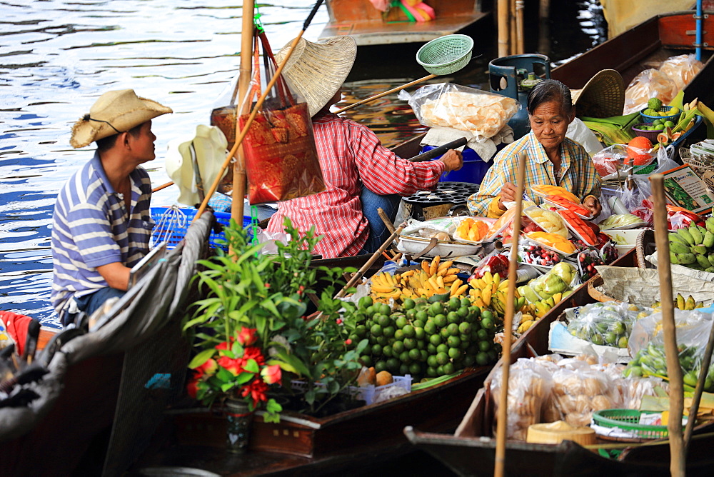 Thai woman selling fruit at floating market, Bangkok, Thailand, Southeast Asia, Asia