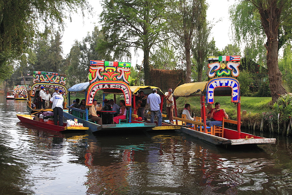 Brightly painted boats, Xochimilco, Trajinera, Floating Gardens, Canals, UNESCO World Heritage Site, Mexico City, Mexico, North America