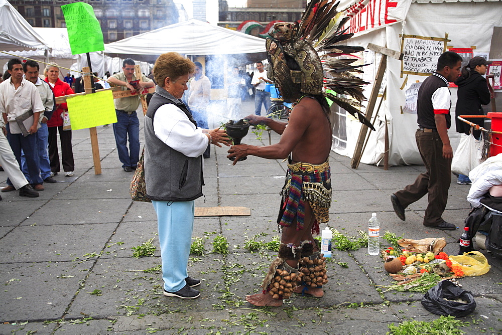 Aztec folk healer, shaman practising spiritual cleansing, Zocalo, Plaza de la Constitucion, Mexico City, Mexico, North America