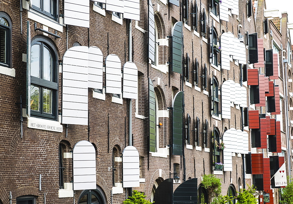 Old canal warehouses converted to houses, Amsterdam, Netherlands, Europe 