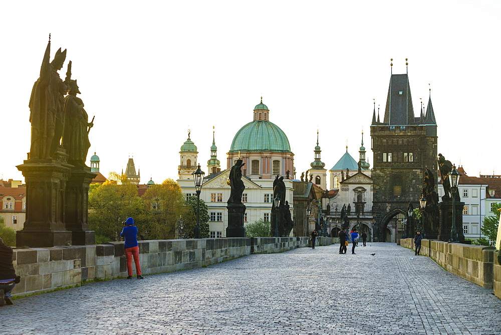 Early morning on Charles Bridge looking towards the Old Town, UNESCO World Heritage Site, Prague, Czech Republic, Europe