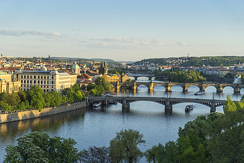 Cityscape looking down the Vltava River at the bridges connecting the Old Town to Mala Strana, Prague Castle and Hradcany, Prague, Czech Republic, Europe