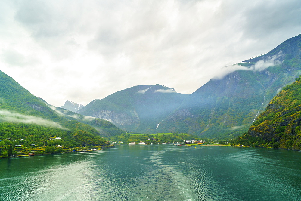 The small town of Flam situated at the innermost part of Aurlandsfjord, a branch of Sognefjord, a popular tourist destination as the Flam Railway, Flamsbana, departs from here, Flam, Norway, Scandinavia, Europe