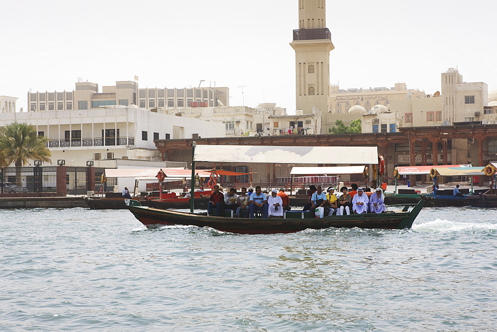 Abra water taxi crossing The Creek between Dur Dubai and Deira, Dubai, United Arab Emirates, Middle East