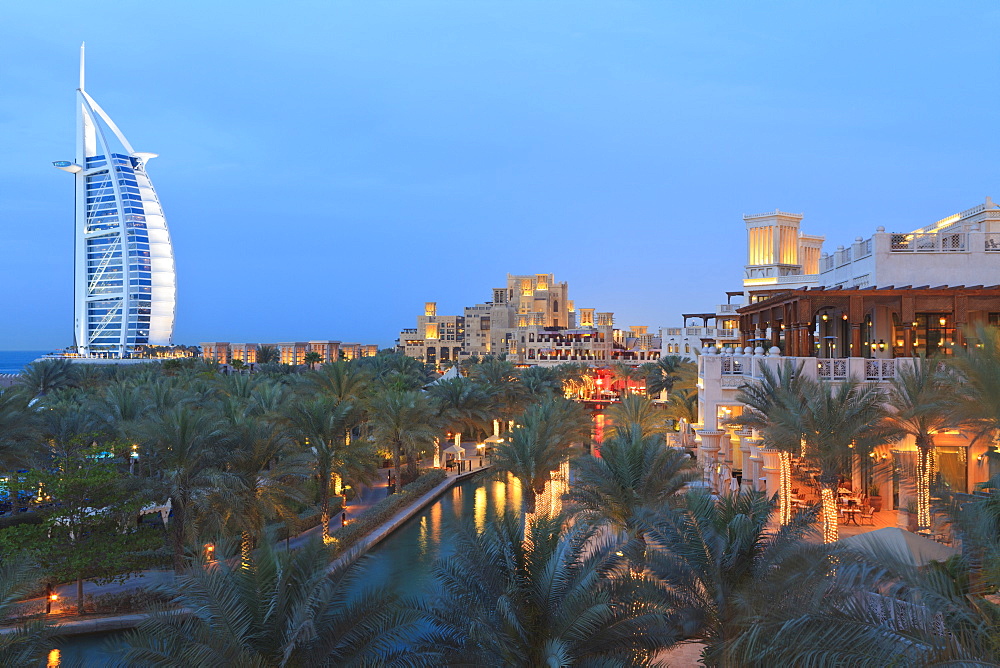 Burj Al Arab viewed from the Madinat Jumeirah Hotel at dusk, Jumeirah Beach, Dubai, United Arab Emirates, Middle East