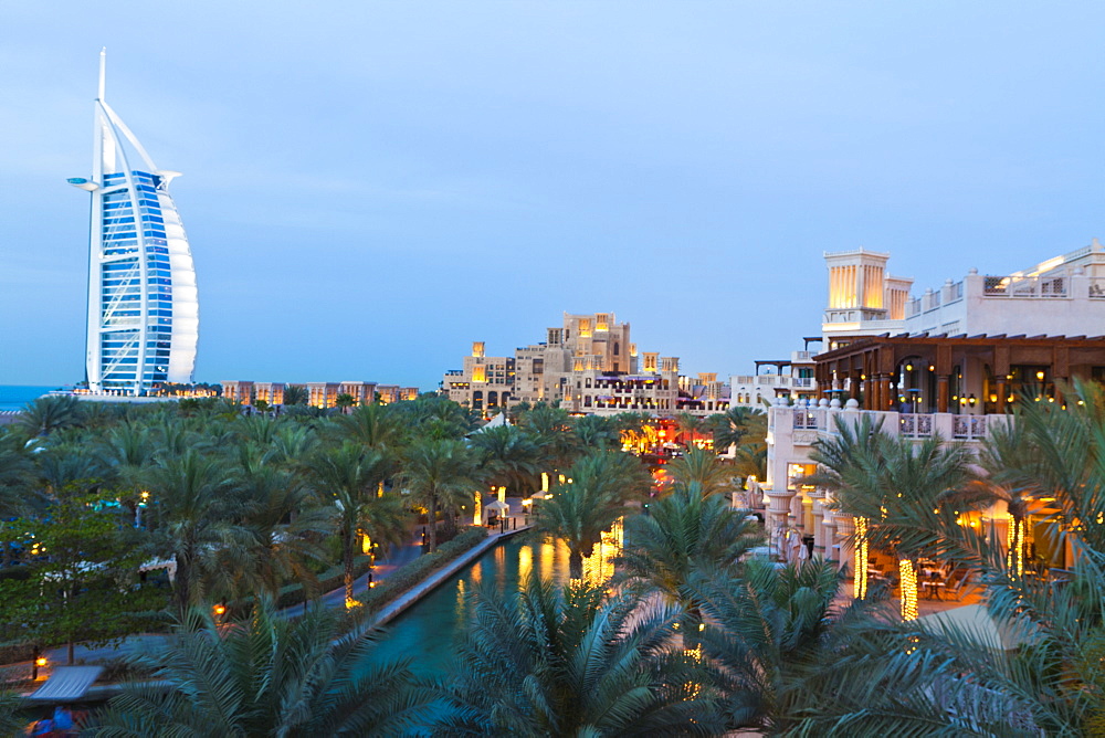 Burj Al Arab and Madinat Jumeirah Hotels at dusk, Dubai, United Arab Emirates, Middle East