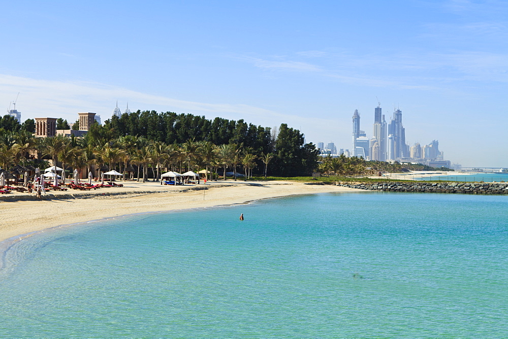 Jumeirah Beach looking towards the tall buildings of Dubai Marina, Dubai, United Arab Emirates, Middle East