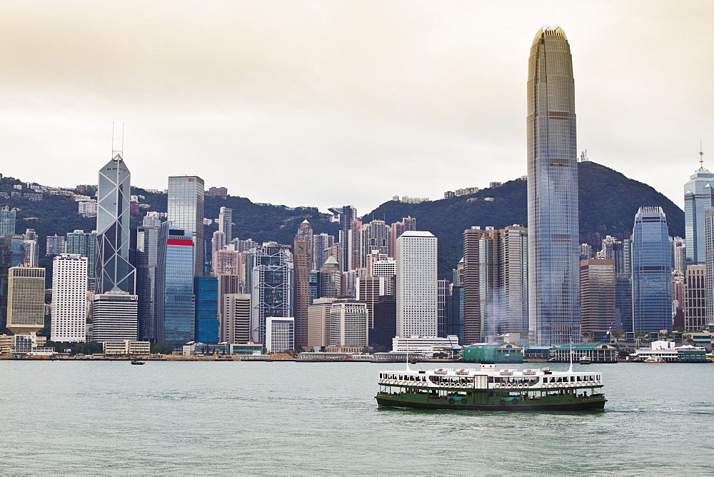 Star Ferry crossing Victoria Harbour towards Hong Kong Island, Two International Finance Centre tower (2IFC), on the right, Hong Kong, China, Asia