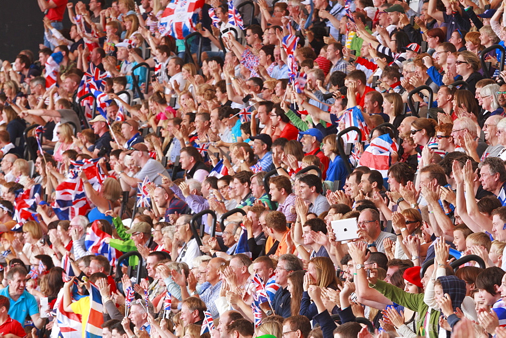 Large crowd of British spectators with Union flags in a sports arena, London, England, United Kingdom, Europe