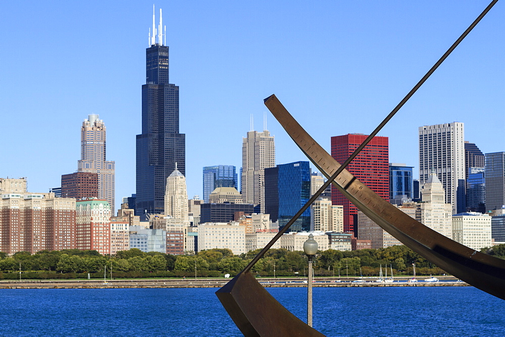 Chicago cityscape from Lake Michigan, the Adler Planetarium Sundial in the foreground with the Willis Tower, formerly the Sears Tower, beyond, Chicago, Illinois, United States of America, North America 