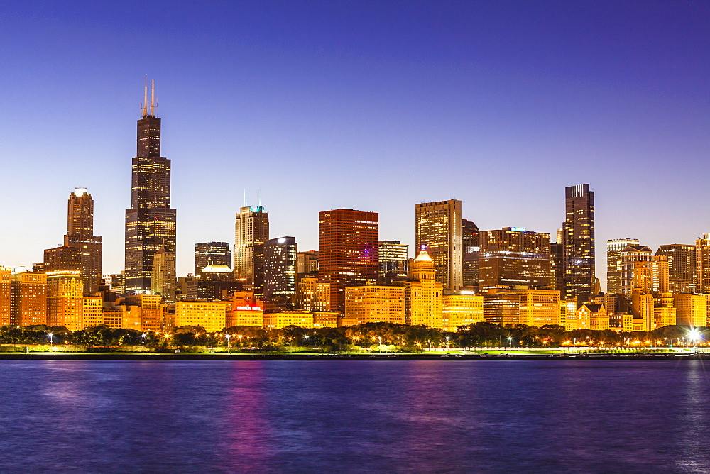 Chicago skyline and Lake Michigan at dusk with the Willis Tower, formerly the Sears Tower, on the left, Chicago, Illinois, United States of America, North America 