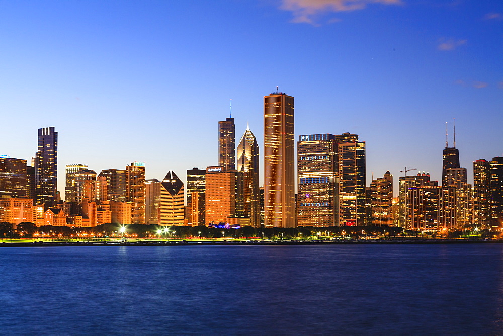 Chicago skyline and Lake Michigan at dusk, Chicago, Illinois, United States of America, North America 