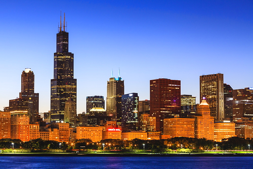 Chicago skyline and Lake Michigan at dusk with the Willis Tower, formerly the Sears Tower, on the left, Chicago, Illinois, United States of America, North America 